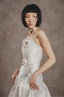 Ivory Bloom Ball Gown by White Plan featuring a full-length elegant dress with floral embellishments and a fitted waist.