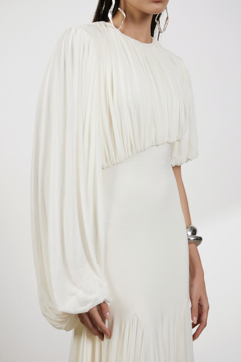 Deme By Gabriella Luna Maxi Dress in flowing fabric with a flattering fit, perfect for elegant summer occasions.