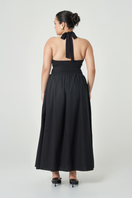 Black Cannes maxi dress by Summer Away with flowing fabric and sleeveless design, perfect for elegant summer occasions.