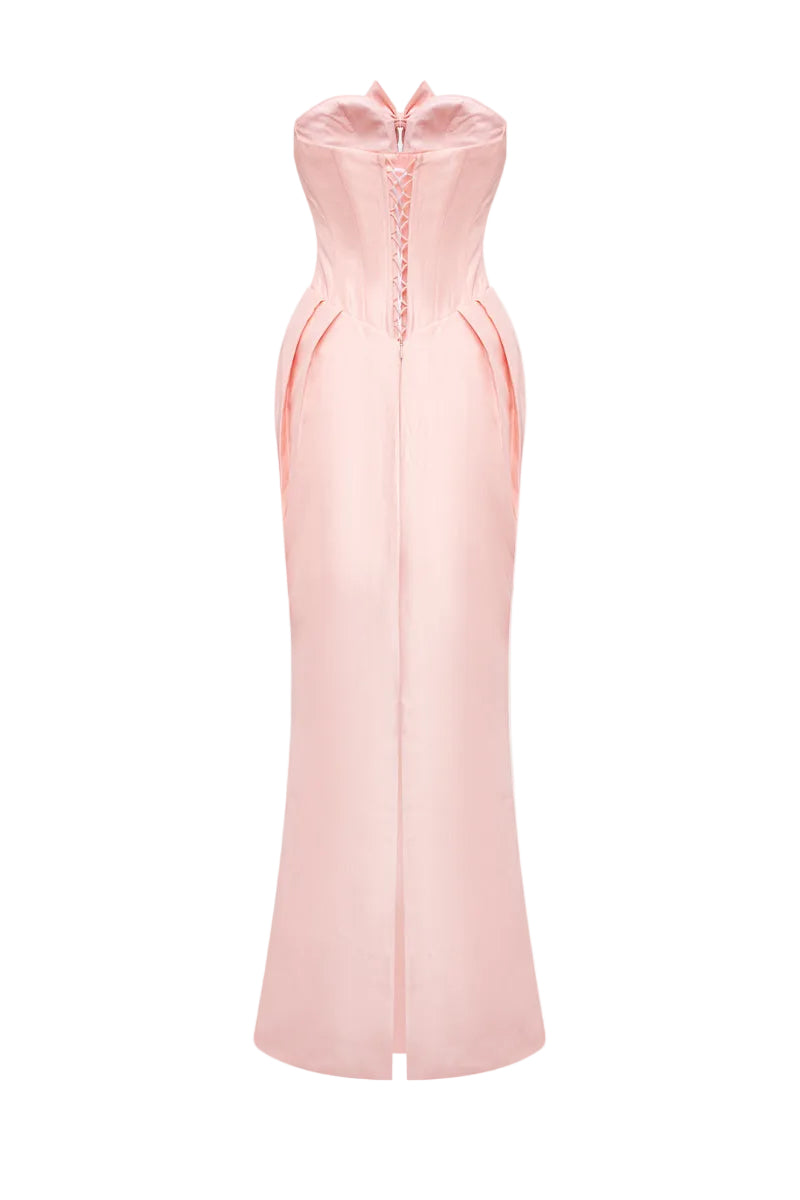 Blush pink strapless bow gown by HACCHIC COUTURE featuring elegant design, flowing fabric, and a sophisticated silhouette.