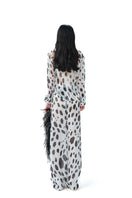 Leopard print co-ord set by Do Long featuring matching top and pants with trendy animal print design.