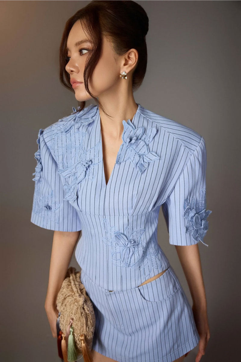 Blue minimal stripe skort from KEIRA TONG, featuring a sleek design with subtle vertical stripes and a comfortable fit.