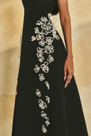 L'SCARLETT sleeveless poly crepe midi flared gown with a fitted bodice and flowing skirt, perfect for elegant occasions.