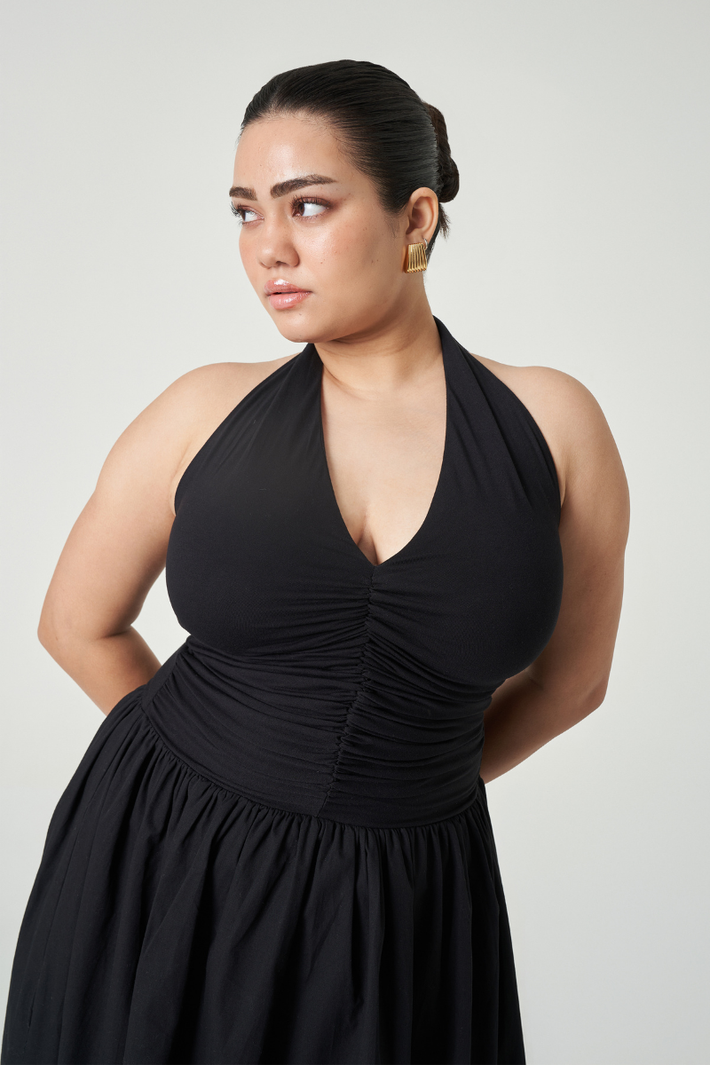 Black Cannes maxi dress by Summer Away, flowing fabric and elegant design, suitable for summer occasions.