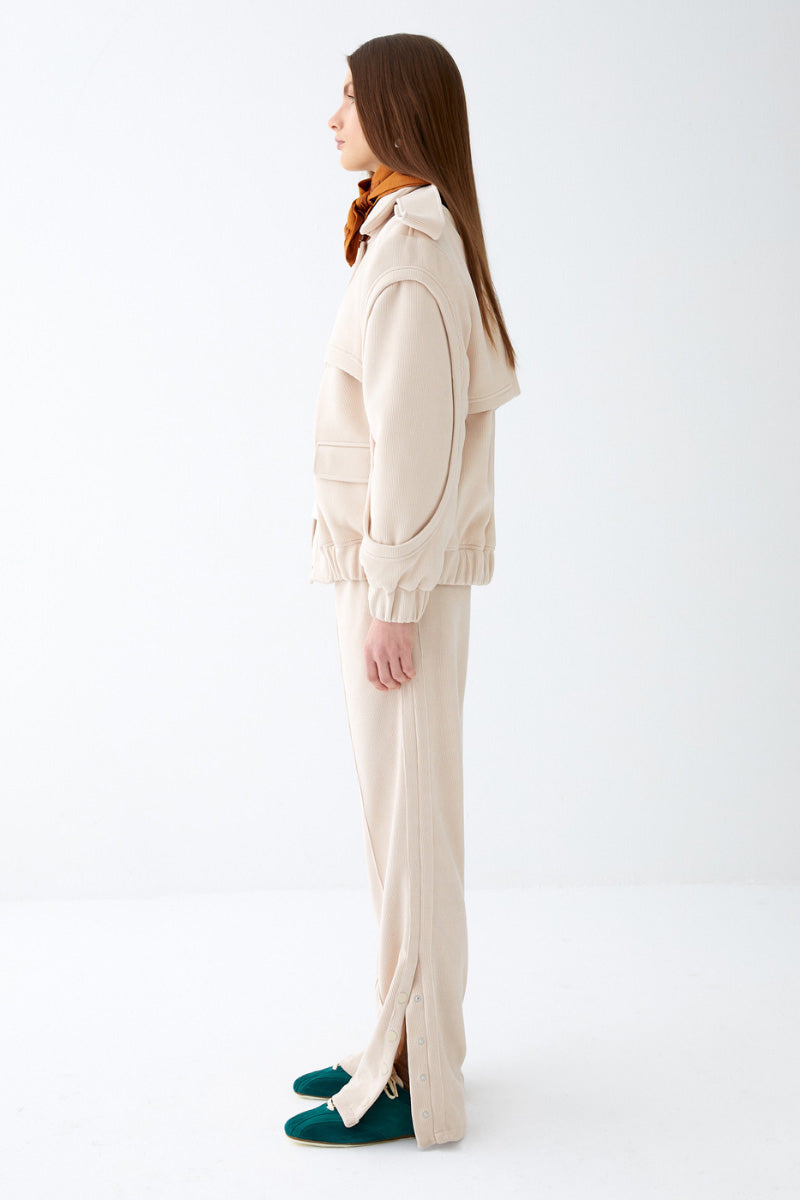 Soft cream sweat pants from ColoReve with a relaxed fit and cozy fabric, shown laid flat on a neutral background.