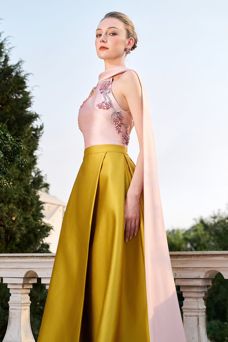 Pink and yellow bamboo taffeta gown by Tracy Studio, flowing design with elegant fabric and detailed draping.