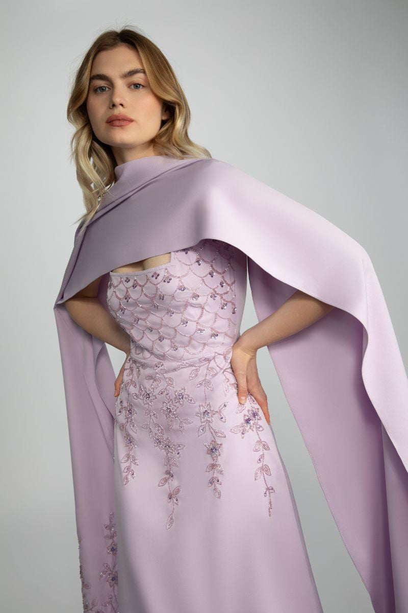 Elegant Lacey gown by Raishma featuring intricate lace details and a flowing silhouette, perfect for formal occasions.