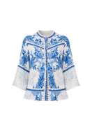 Raishma MYRA shirt featuring a stylish design, shown on a hanger with detailed fabric texture and vibrant color.