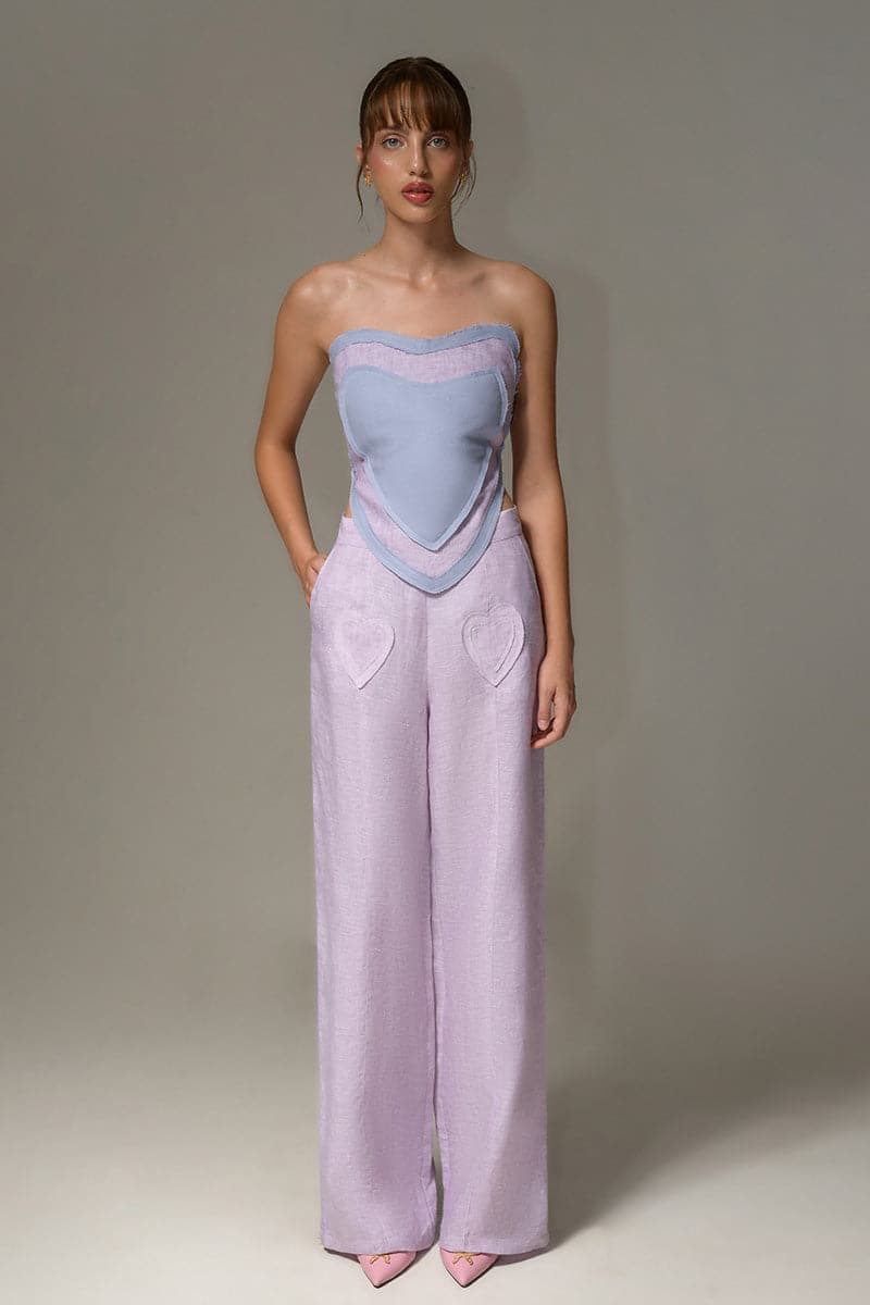 Liya sky blue and lilac sweetheart double top with floral pattern, sleeveless design, and fitted style seen in the image.
