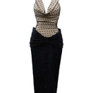 Do Long Chronique Midi Dress featuring a flowy fabric and elegant silhouette, perfect for stylish occasions.