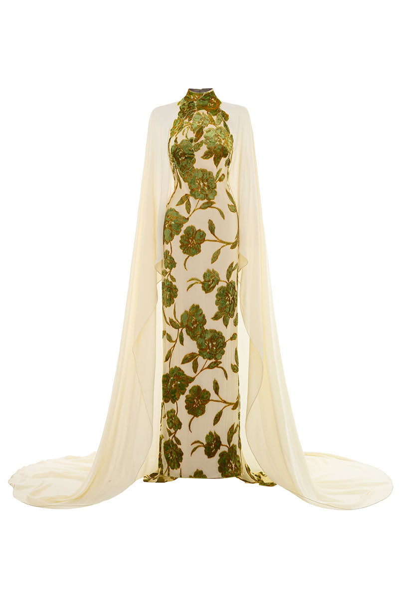 Le Thanh Hoa velvet flora chiffon gown featuring a flowing silhouette with floral patterns and elegant fabric details.