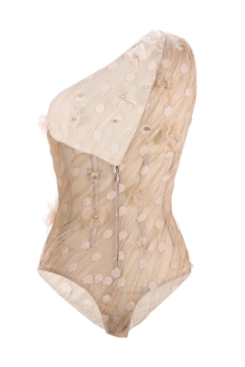 Aquarel Studio PSAMANTHE top in a light, flowy fabric with a relaxed fit and stylish neckline, displayed on a hanger.
