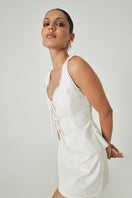 Off-white Bahia top by Summer Away, stylish sleeveless blouse with a relaxed fit and subtle detailing, ideal for casual wear.