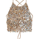 Crochet mother of pearl top by Mirel Prentice featuring intricate crochet details and shimmering pearl accents.