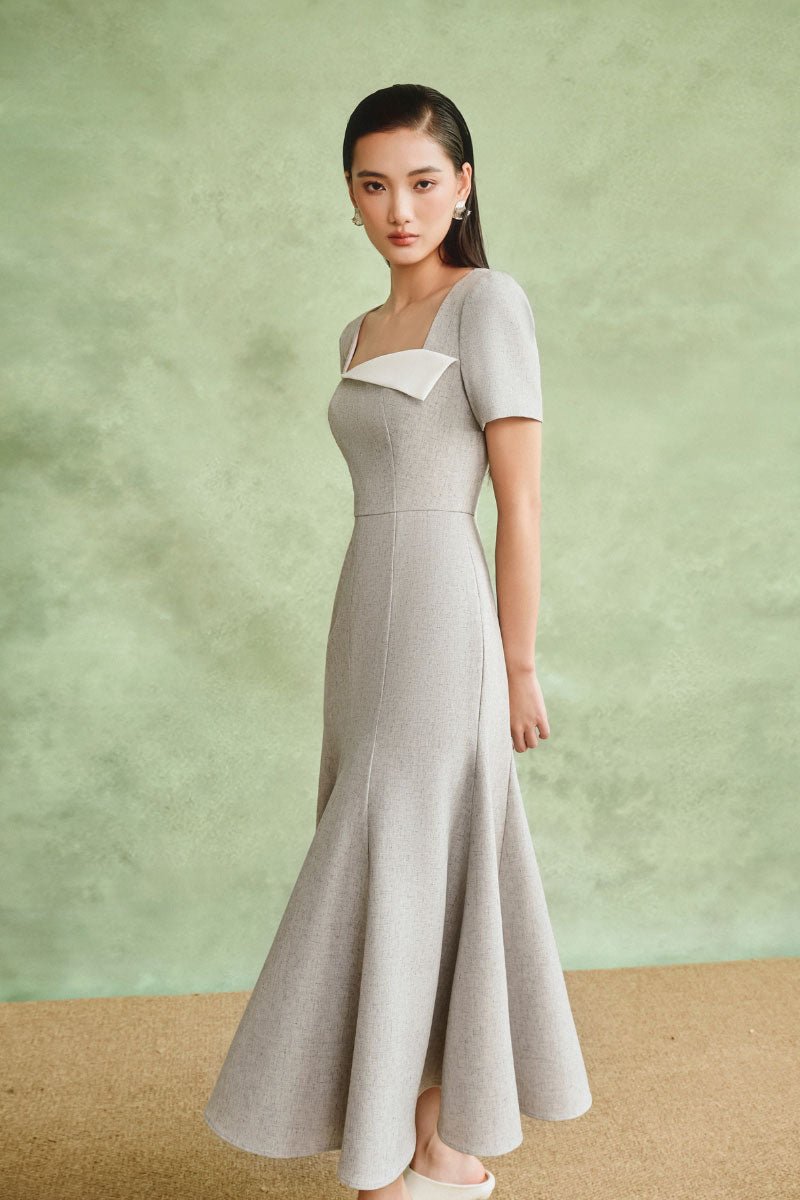 White Plan minimalist square-neck midi dress, showcasing a sleek, fitted design with clean lines and a midi length silhouette.