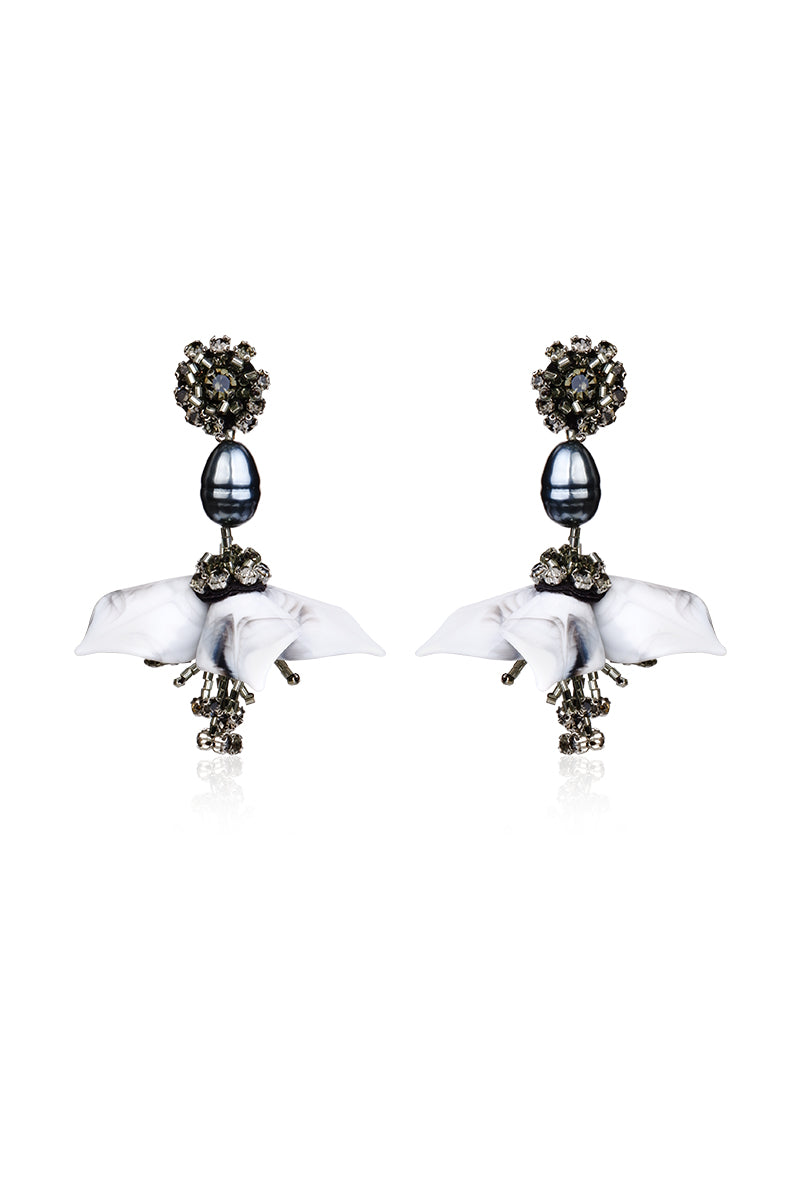 A pair of DEW DROP gray earrings from Aidan & Ice featuring elegant, teardrop-shaped dangle earrings.
