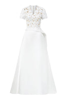 White satin taffeta gown by Lune De Soie featuring a flowing design and elegant fit.
