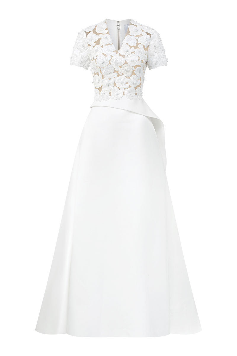 White satin taffeta gown by Lune De Soie featuring a flowing design and elegant fit.