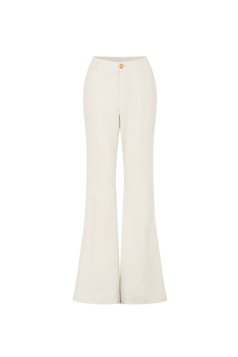 White LUNARIA trousers by POEM, stylish pants featuring a tailored fit and soft fabric, shown on a model.