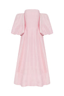 Petal pink BY HAÓ Magnifica midi dress displayed on a hanger, showcasing its elegant design and soft fabric.