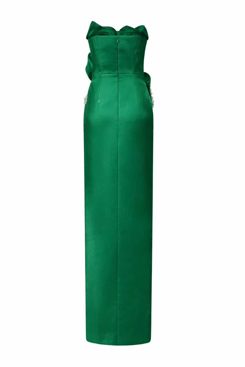 Emerald green Sirena Water Silk Taffeta gown by 21Six, showcasing a flowing, elegant evening dress with detailed fabric texture.