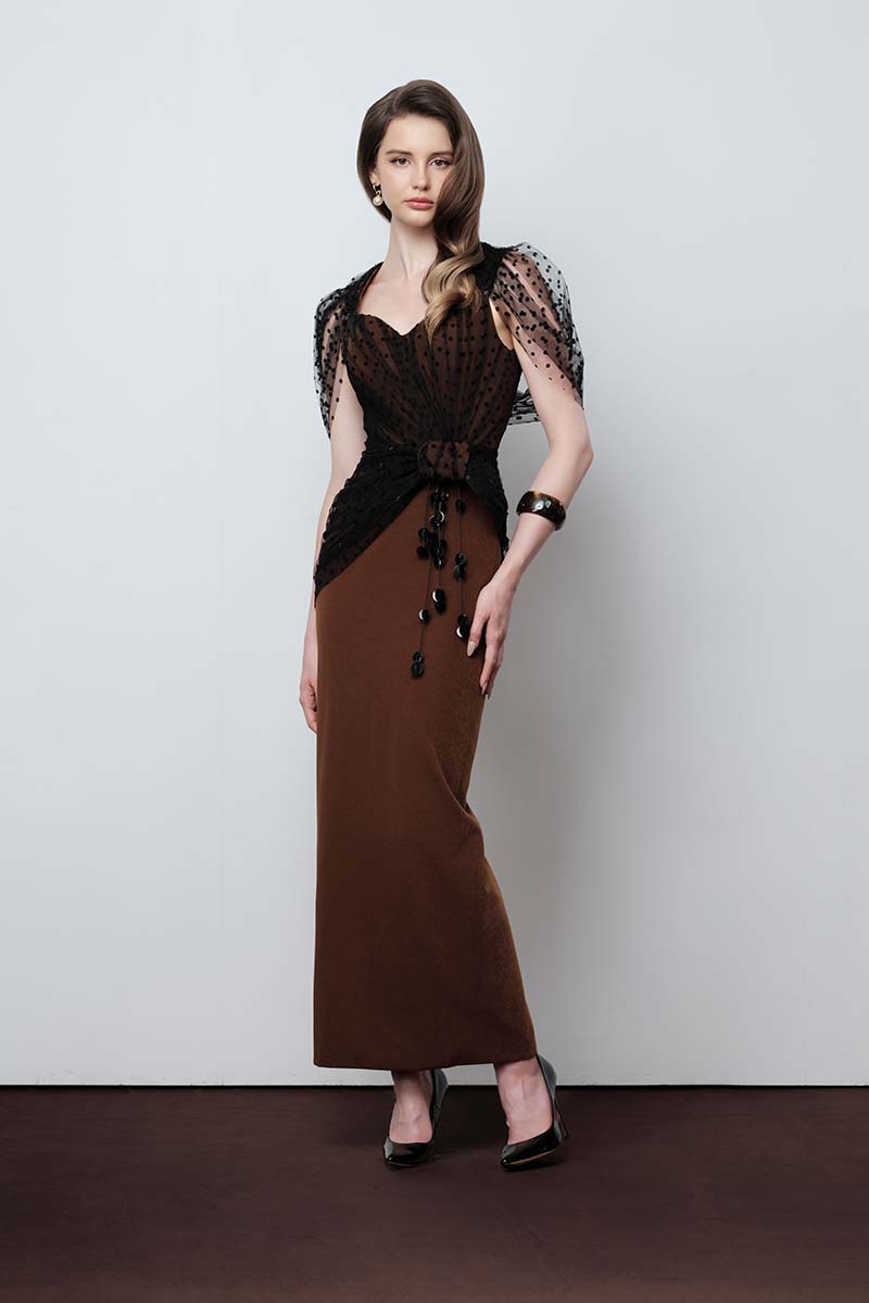 Elegant Do Long Urban Muse gown featuring a flowing silhouette and intricate detailing, perfect for stylish formal occasions.