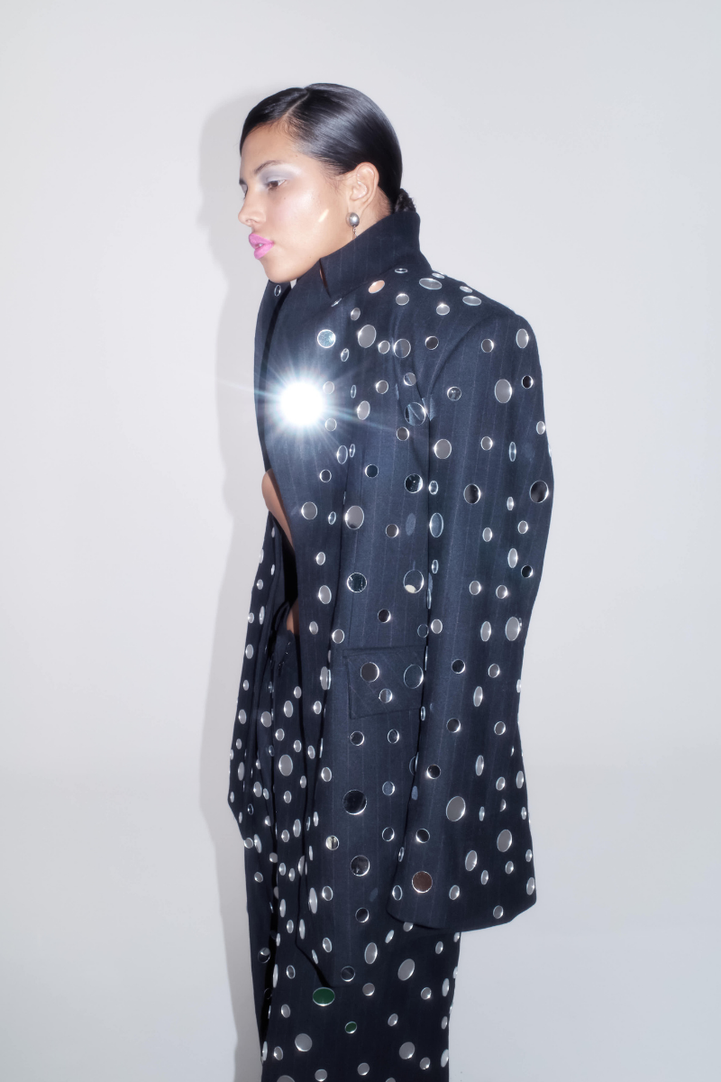 Sudi Etuz mirror-covered straight-cut pants featuring reflective embellishments and a sleek, tailored fit.
