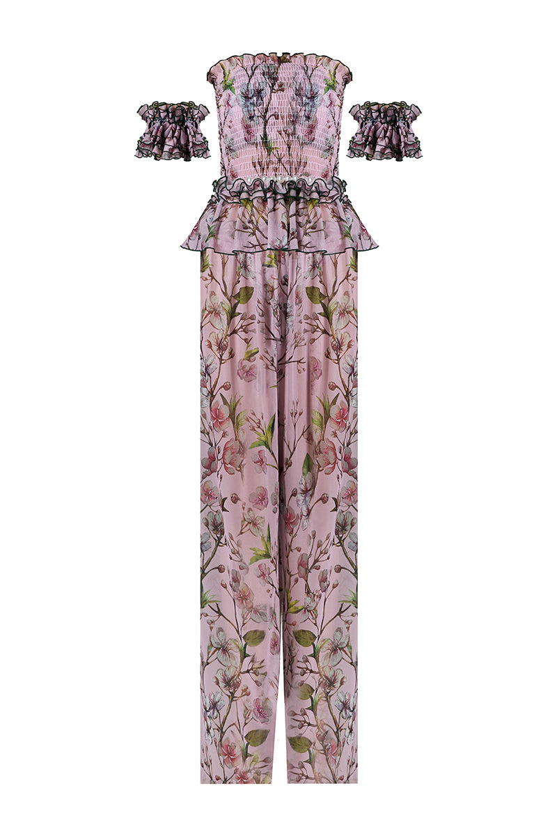 Nur Karaata Tropic Allure Co-ord Set featuring a vibrant, patterned top and matching pants displayed on a mannequin.