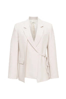 SÉLONE Helia Wrap Blazer in Stone, tailored blazer with a wrap design, featuring a neutral stone color and classic lapel style.