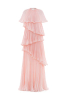 Pink tiered gown by Le Thanh Hoa featuring ruffled layers and flowing fabric, perfect for elegant occasions.