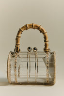 Waiwai Rio Alix Bambu Bag in Crystal, a stylish clear top handle bag with bamboo accents and transparent design.