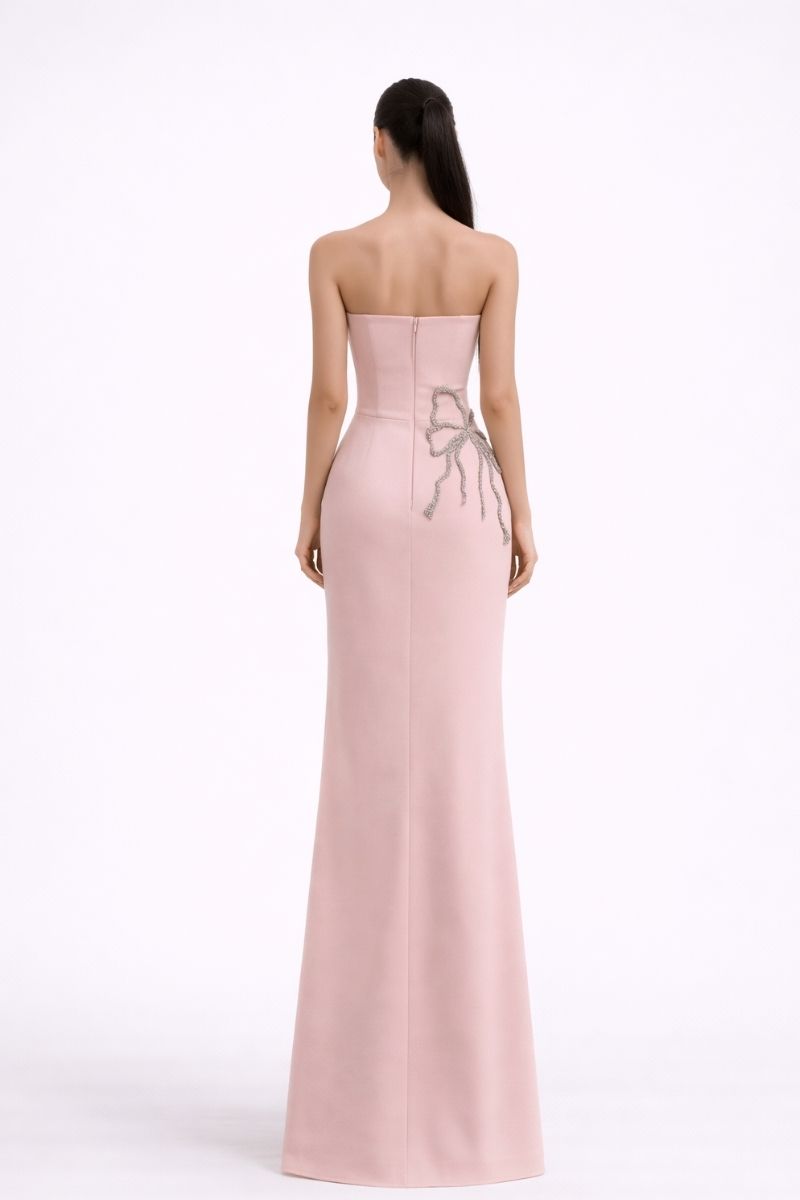 Nihan Peker pink gown with soft fabric, flowing design, and elegant style, perfect for formal or special occasions.
