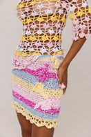 Handmade mini crochet skirt by Andreeva featuring a vibrant Bird of Paradise pattern and intricate craftsmanship.