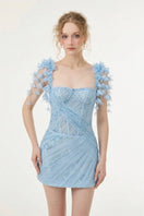 Light blue Catalina tulle and lace mini dress by 21Six, featuring delicate lace details and a flowing tulle skirt.