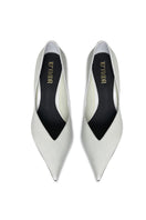White 10TH FLOOR Uptown Heels with sleek design and pointed toes, stylish footwear for formal or casual occasions.