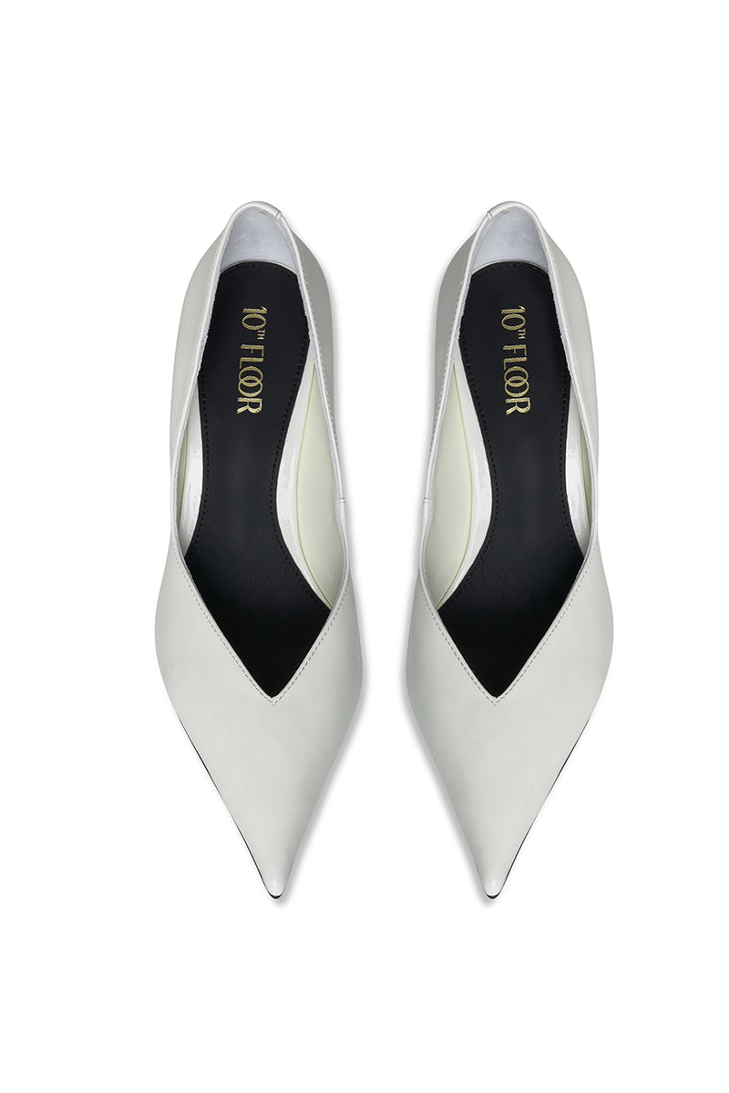 White 10TH FLOOR Uptown Heels with sleek design and pointed toes, stylish footwear for formal or casual occasions.