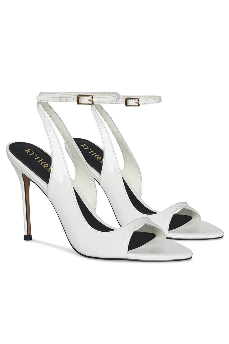 White 10th Floor Midnights Heels featuring a sleek design and pointed toe, perfect for formal and evening wear.