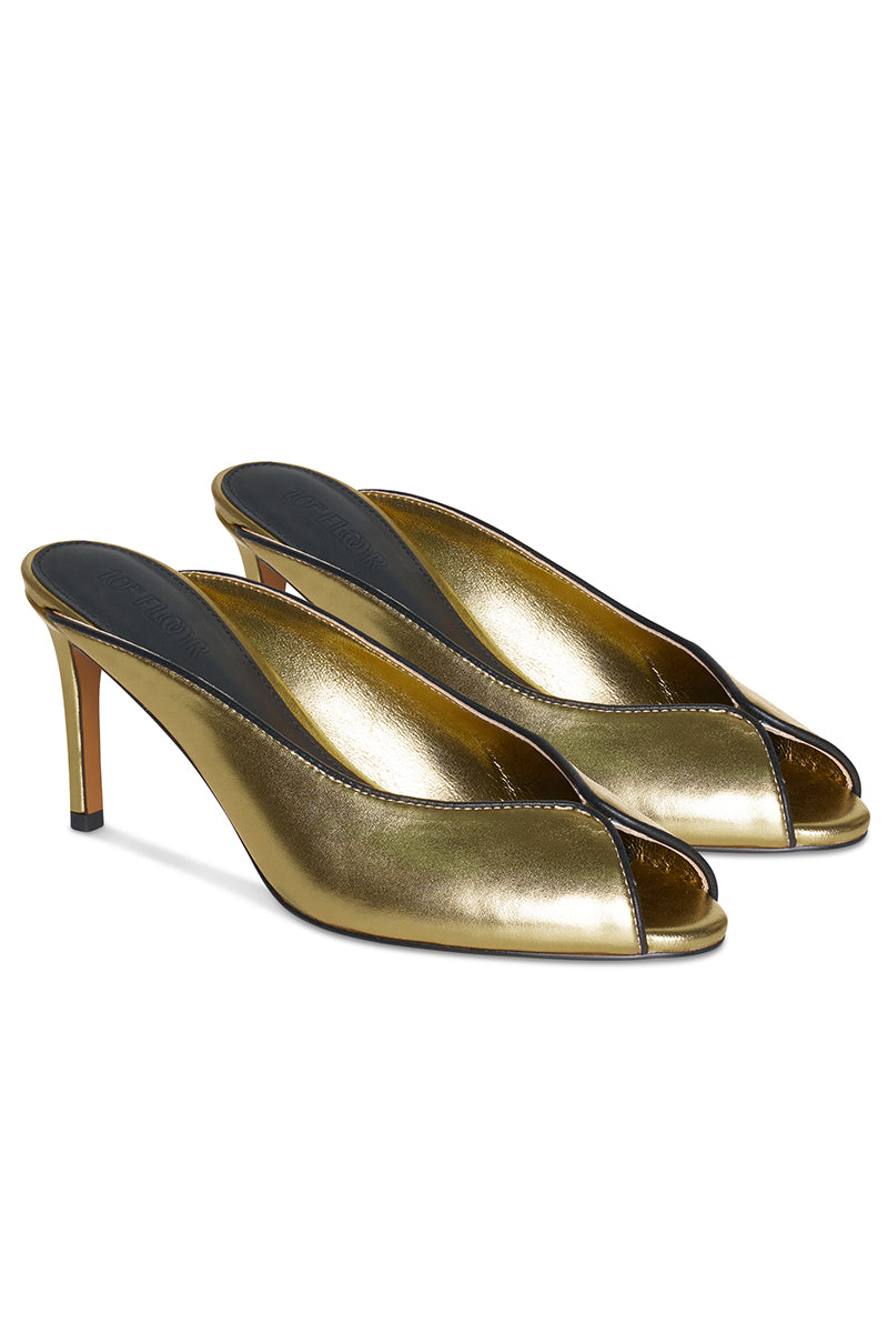 Gold Riva heels by 10th Floor featuring sleek design, open toe, and stiletto heel for elegant style.