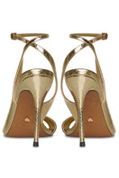 Gold high heels from 10th Floor's Midnights Heel collection, featuring elegant stiletto design and stylish ankle strap.