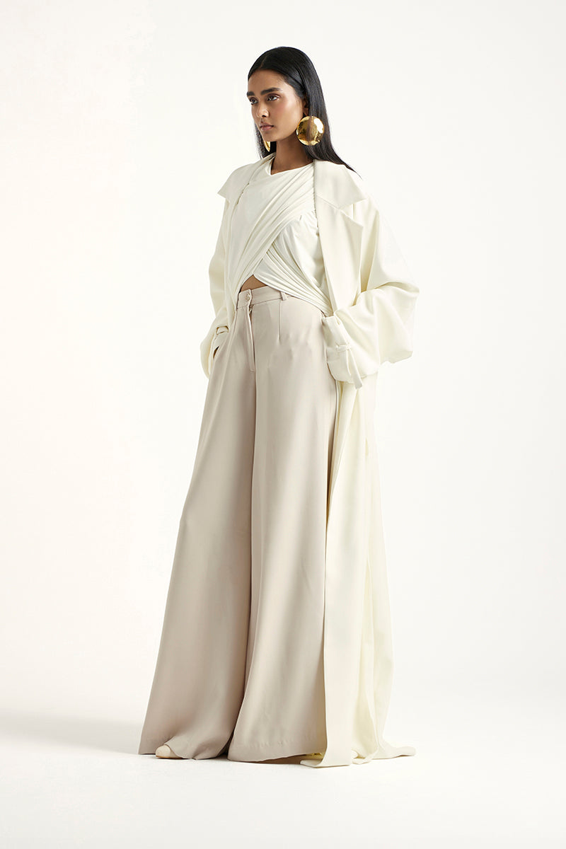 Deme By Gabriella Laurie co-ord set in off white and beige, featuring matching top and trousers with a relaxed fit.
