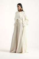 Deme By Gabriella Laurie co-ord set in off white and beige, featuring matching top and trousers styled for casual or chic wear.