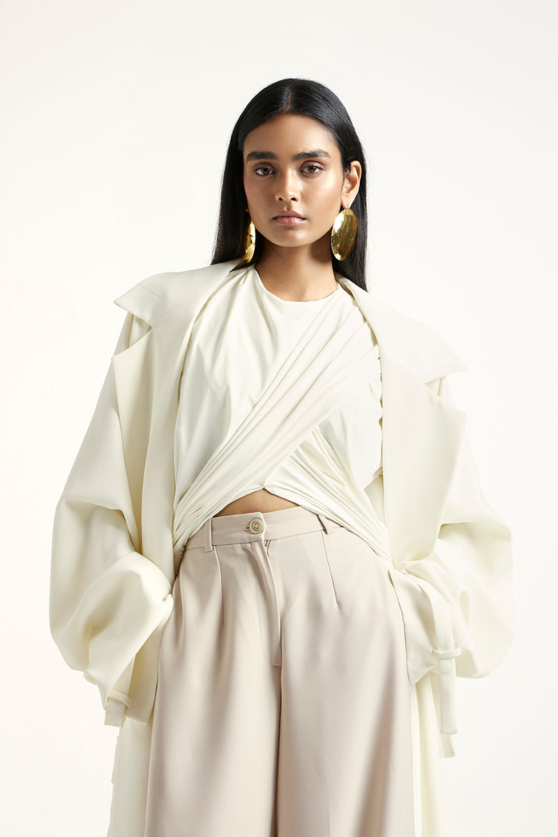 Deme By Gabriella Laurie co-ord set in off-white and beige, featuring matching top and pants with a stylish, coordinated look.