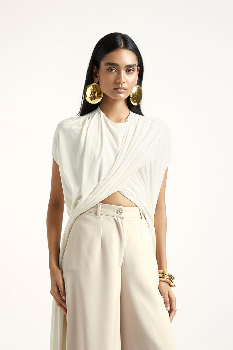 Deme By Gabriella Laurie co-ord set in off white and beige, featuring matching top and pants with a stylish, coordinated look.