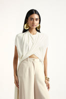 Deme By Gabriella Laurie co-ord set in off-white and beige, featuring matching top and pants with a stylish, coordinated look.