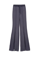 Purple high-waisted sheer pants by Kris Marán displayed on a model, showcasing the lightweight, see-through fabric and stylish fit.