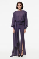 Kris Marán high-waisted sheer purple pants featuring a flowy, lightweight fabric and elegant fit.
