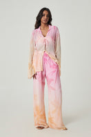 Summer Away LEON pants in Afterglow fabric, showing a relaxed fit and stylish design in a natural pose.