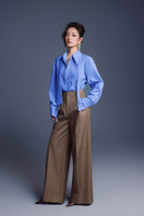 Blue New Thera shirt by Keira Tong, featuring a casual shirt design with a relaxed fit and button-up front.