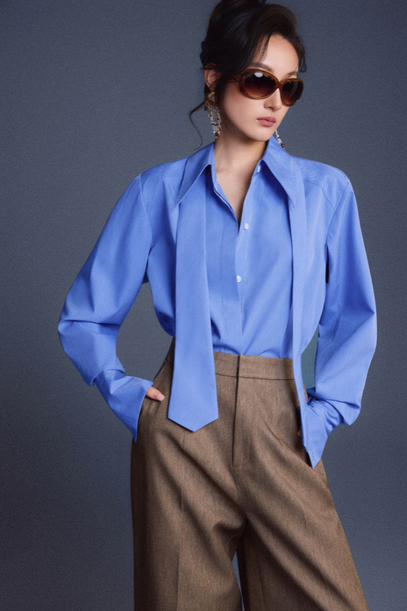 Blue New Thera Shirt by Keira Tong, showcasing a stylish casual shirt with a modern fit and soft fabric.