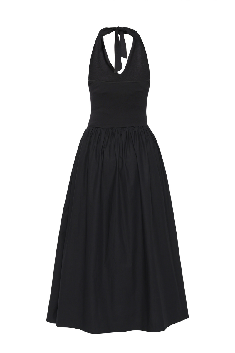 Black Cannes maxi dress by Summer Away, featuring a flowing silhouette and elegant design, shown on a model.